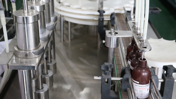 500 ml ronde bottelvulmasjien met dopafdichting en sterwiel